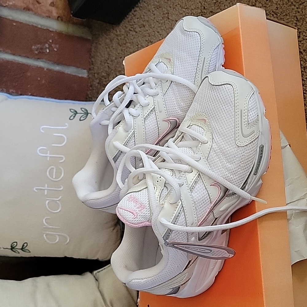 Pink and white Nike Air sneakers size 7